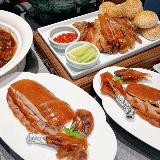 How can you experience authentic Peking ducks in Beijing?