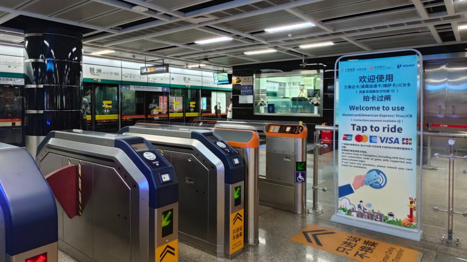 Guangzhou Metro Turnstiles With International Contactless Card Tap-To-Ride Sign